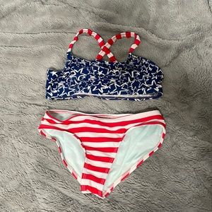 It doesn’t have tags and has been worn a couple times but not in bad condition